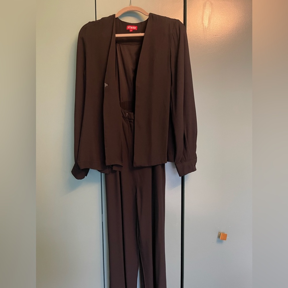 Staud black jumpsuit with open neckline